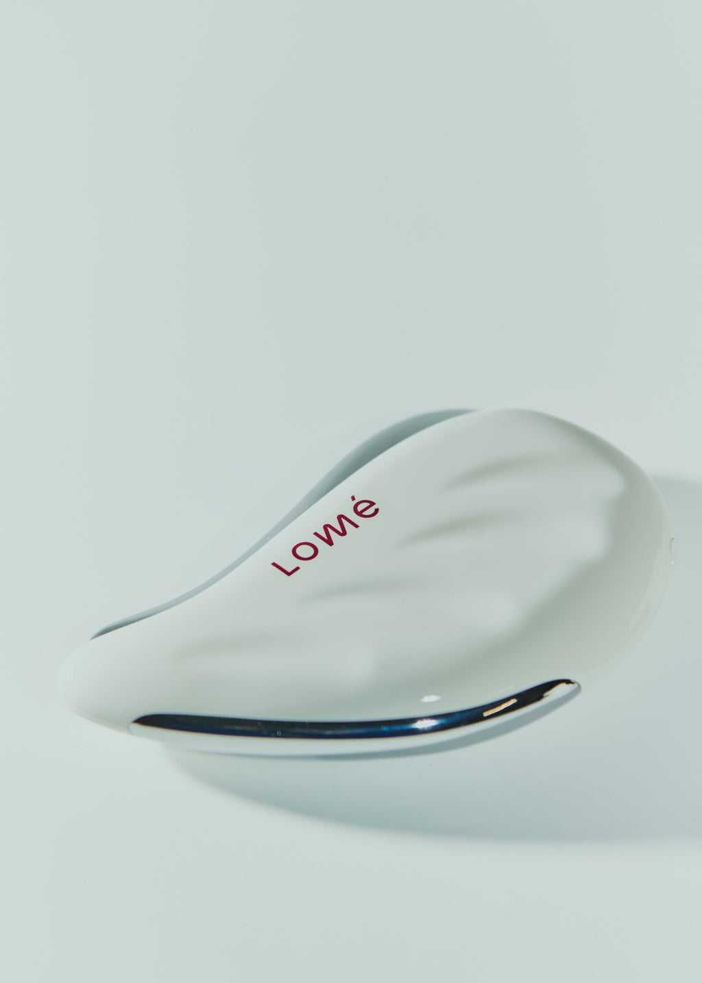 Lomé Glow Gua Sha med mikrostrøm og LED lys til ansigtsmassage